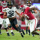 Alabama Crimson Tide quarterback Jalen Milroe (4) carries the ball against the Vanderbilt Commodores during the second half at Bryant-Denny Stadium.